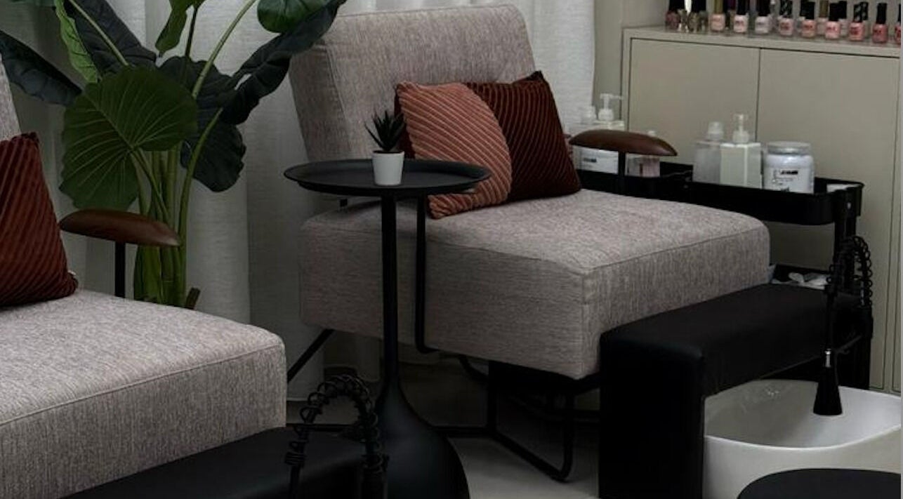 Luxurious pedicure station at La Verte Beauty Salon in Abu Dhabi, Abu Dhabi, AE with plush seating and elegant decor.