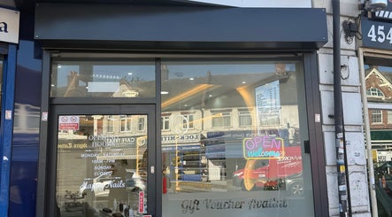 Happy Nails exterior showing signage and glass front in Bromley, England, GB. Inviting and modern salon entry.