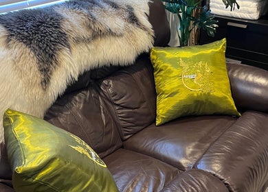 Elegant leather couch with green cushions at Apsara Wellness in Eastleigh, Southampton, Fair Oak, England, GB.