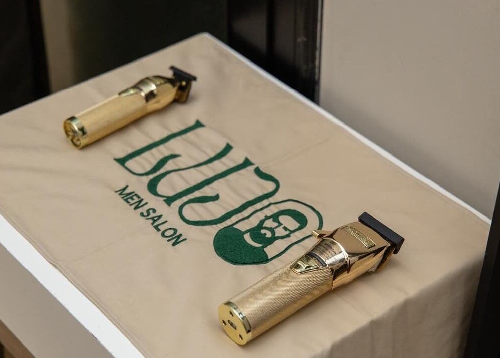 Gold clippers on a Lujo Barbershop mat in Al Khobar, Eastern Province, SA.