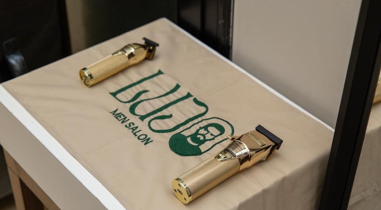 Gold clippers on a Lujo Barbershop mat in Al Khobar, Eastern Province, SA.