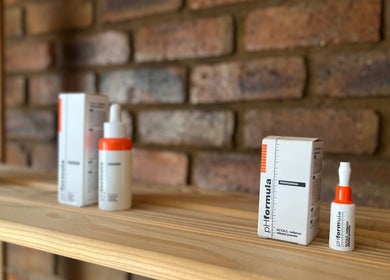 Skincare products displayed on a wooden shelf at Haze Aesthetics, Centurion, Gauteng, ZA.