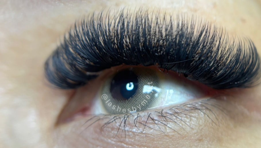 Close-up of lush eyelash extensions by Lashes By Me in Daerah Khusus Ibukota Jakarta, ID.
