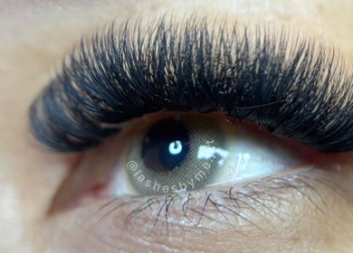 Close-up of lush eyelash extensions by Lashes By Me in Daerah Khusus Ibukota Jakarta, ID.