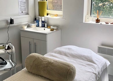 Cozy treatment room at Skin by Cassie, Westhoughton, England, GB, ready for a relaxing wellness session.