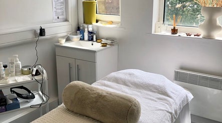Cozy treatment room at Skin by Cassie, Westhoughton, England, GB, ready for a relaxing wellness session.