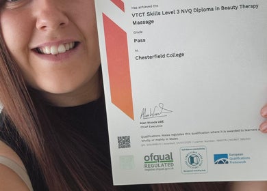 Happy graduate holding beauty therapy diploma, HGbeauty, Warsop, England, GB.