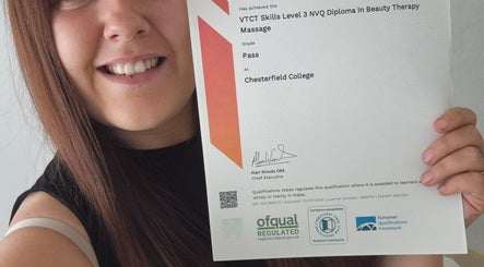 Happy graduate holding beauty therapy diploma, HGbeauty, Warsop, England, GB.