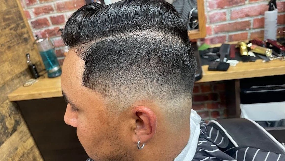 Fresh fade haircut at Crispy Fades in High Prairie, Alberta, CA. Stylish and precise grooming.