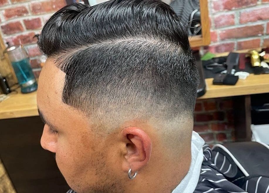 Fresh fade haircut at Crispy Fades in High Prairie, Alberta, CA. Stylish and precise grooming.
