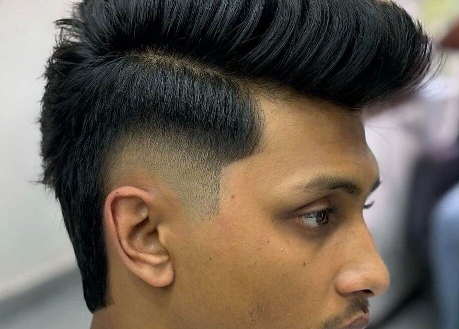 Close-up of a sleek fade haircut at Crispy Fades, High Prairie, Alberta, CA. Stylish look for modern gents.