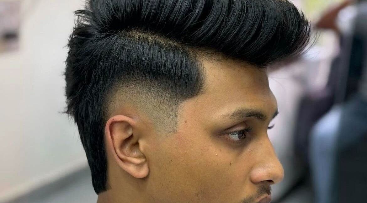 Close-up of a sleek fade haircut at Crispy Fades, High Prairie, Alberta, CA. Stylish look for modern gents.