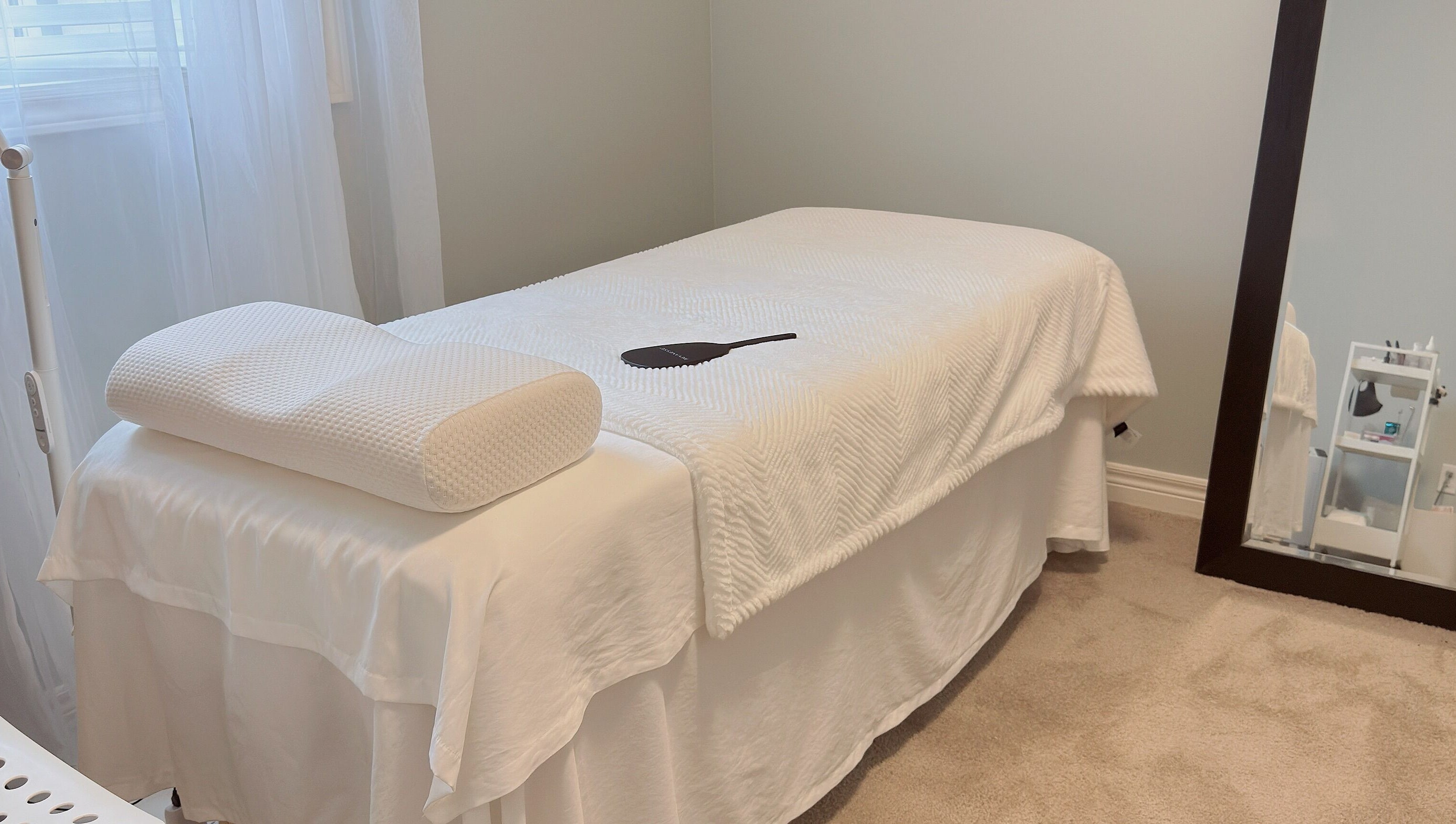 Luxurious treatment bed at ✦ Vki Lash Studio ✦, London, Ontario, CA, perfect for relaxation and wellness.
