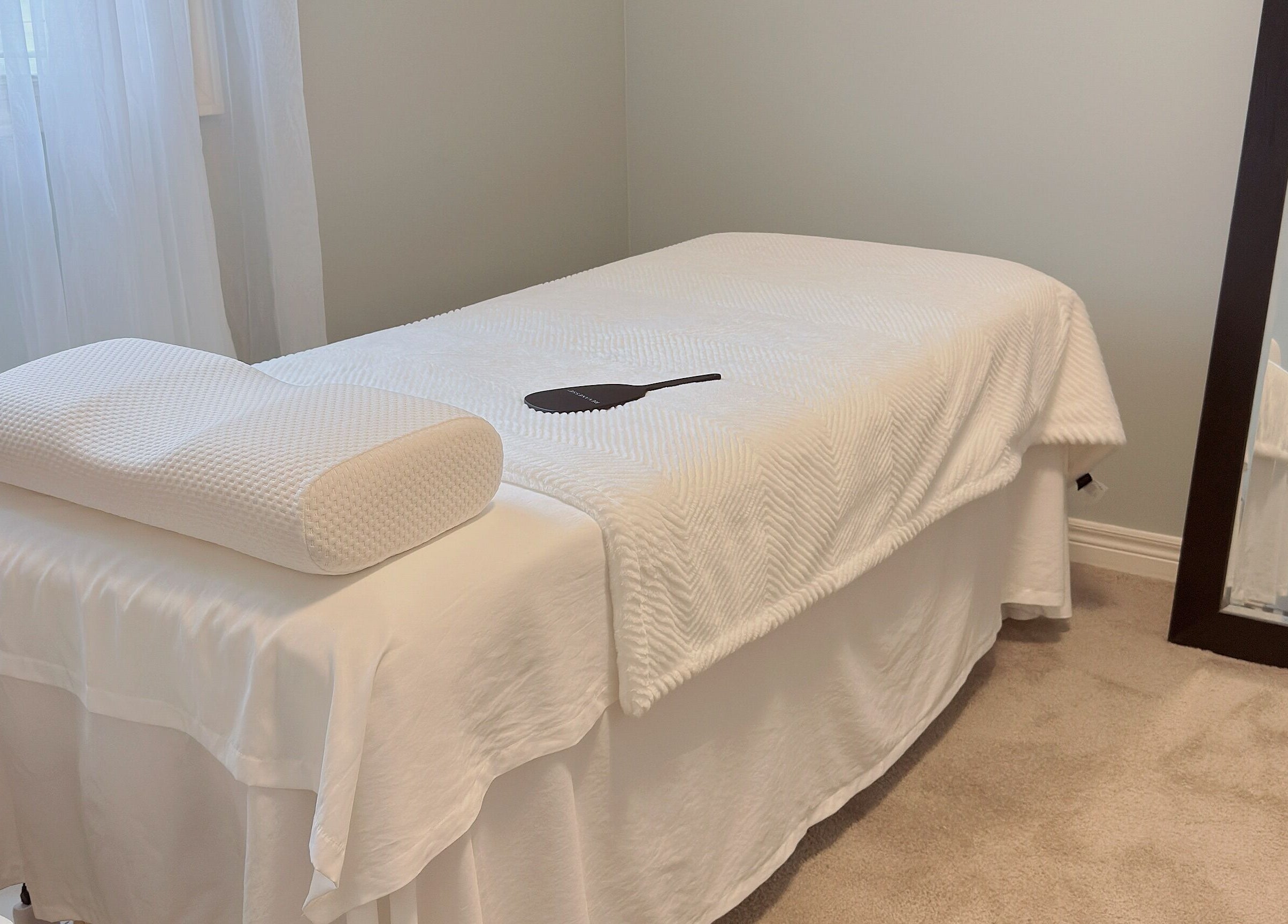 Luxurious treatment bed at ✦ Vki Lash Studio ✦, London, Ontario, CA, perfect for relaxation and wellness.