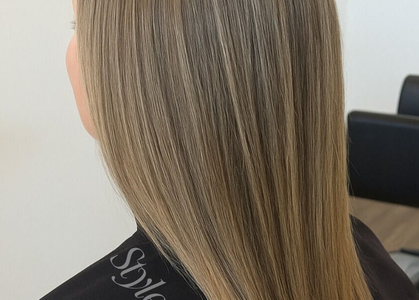 Smooth, sleek hair at Little Hair Nation in Whangārei, Northland, NZ, showcasing expert styling.