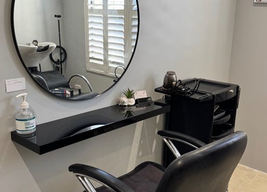 Chic salon chair and mirror at Awhair, Yanchep, Western Australia, AU. Modern design meets comfort.