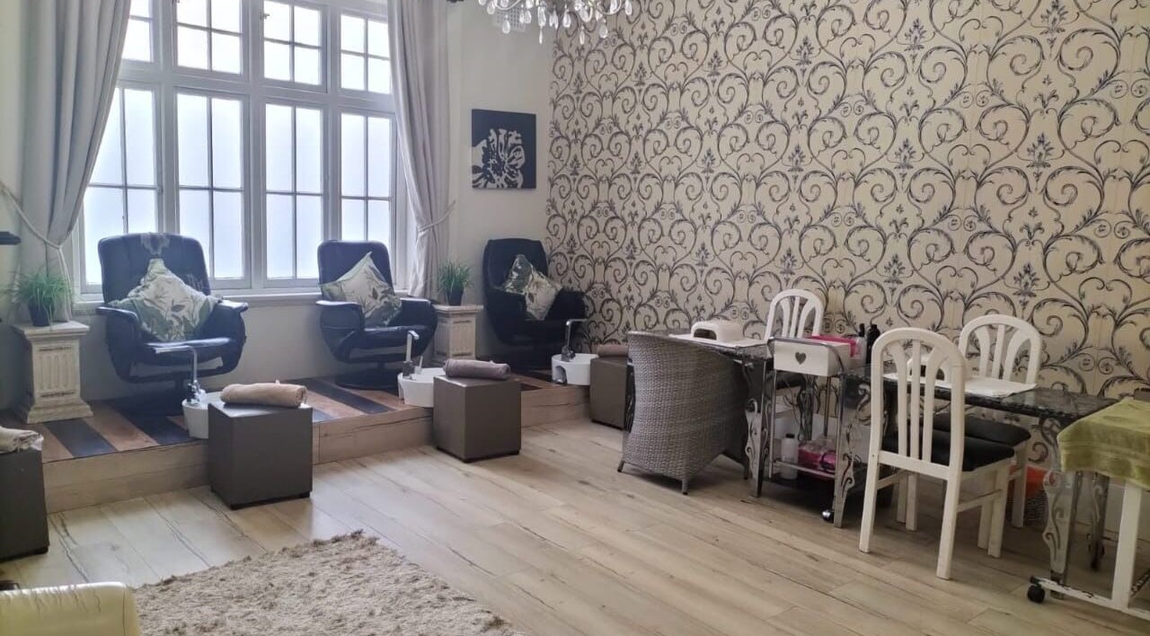 Elegant pedicure and manicure area at HEAVEN ON EARTH DAY SPA in Berea, Kwazulu-natal, ZA, with plush chairs.