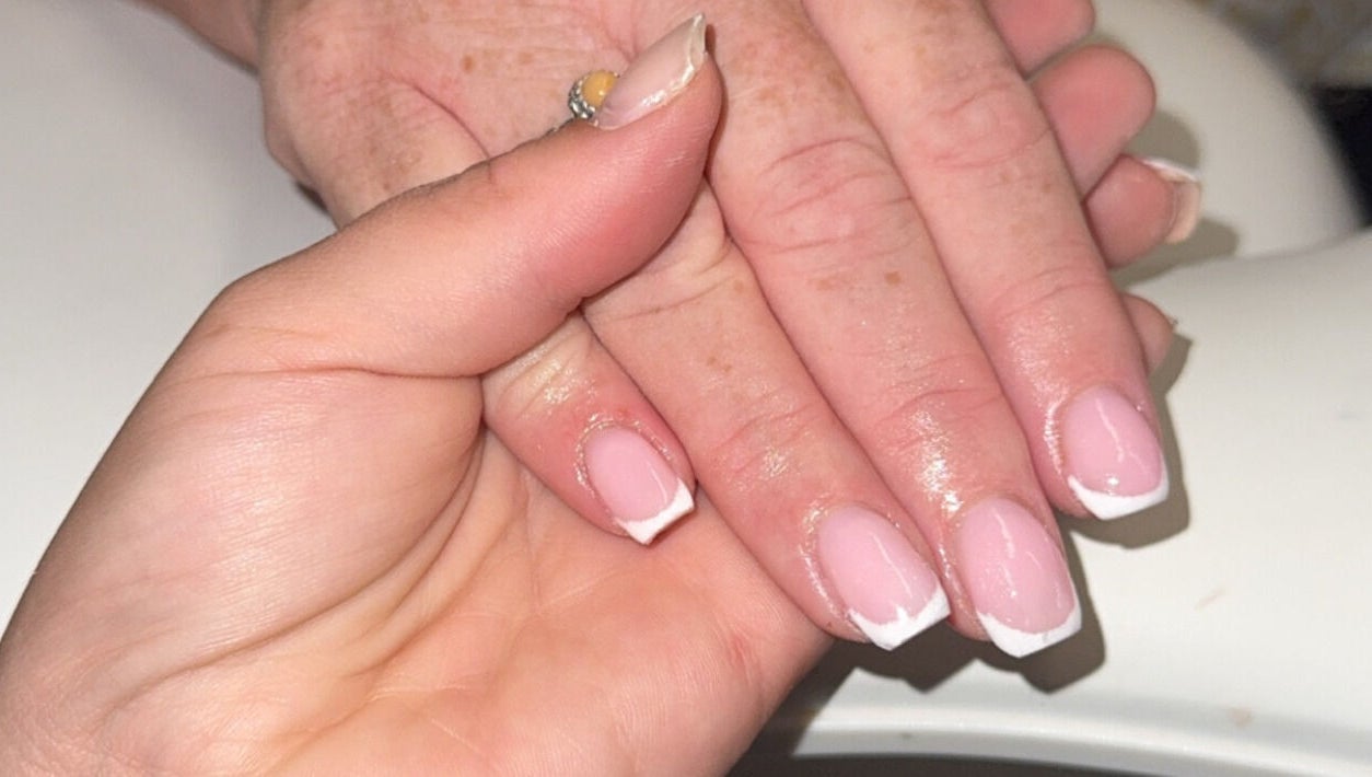 French manicure at Beauté Bar in Dumfries, Scotland, GB, showcasing professional nail care.