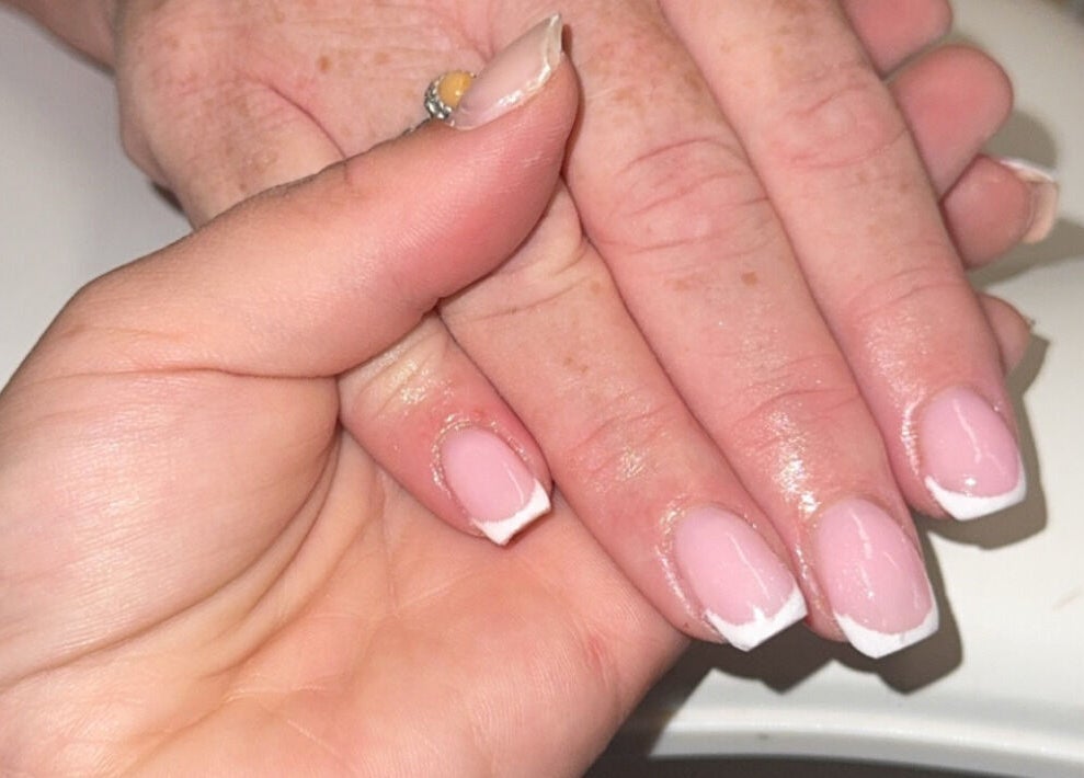 French manicure at Beauté Bar in Dumfries, Scotland, GB, showcasing professional nail care.