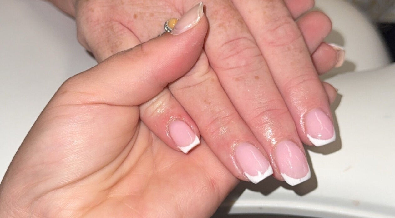 French manicure at Beauté Bar in Dumfries, Scotland, GB, showcasing professional nail care.