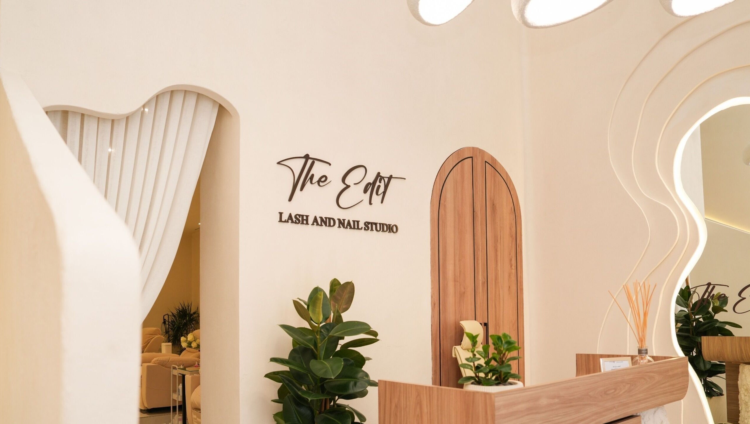 Elegant entrance of The Edit Studio in Jeddah, Makkah Province, SA, showcasing modern interior design.