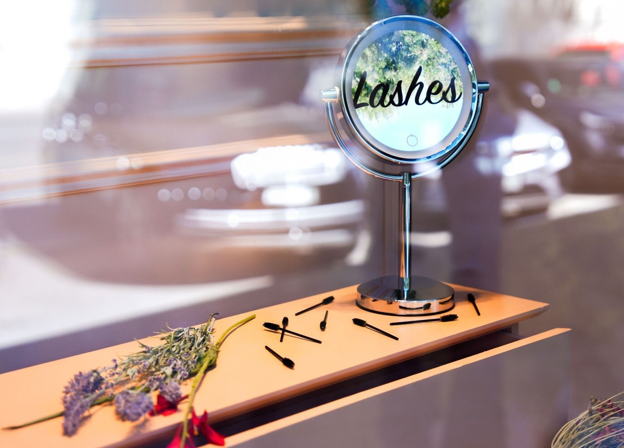 Mirror with 'Lashes' text and brushes at The Edit Studio, Jeddah, Makkah Province, SA.