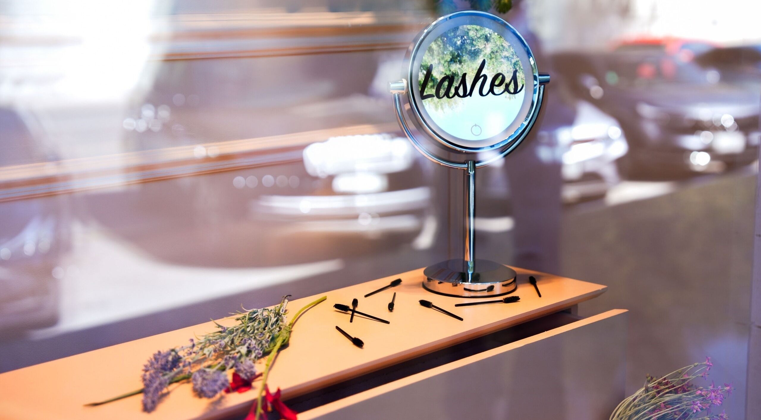 Mirror with 'Lashes' text and brushes at The Edit Studio, Jeddah, Makkah Province, SA.