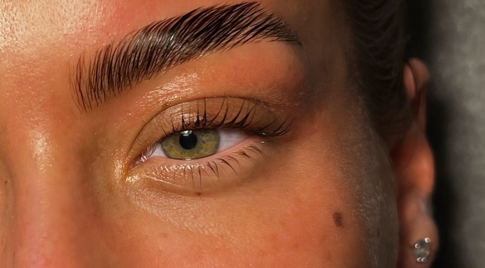 Close-up of styled eyebrows at DEFINED by Isobel Ruby, Lancaster, England, GB for beauty enhancement.