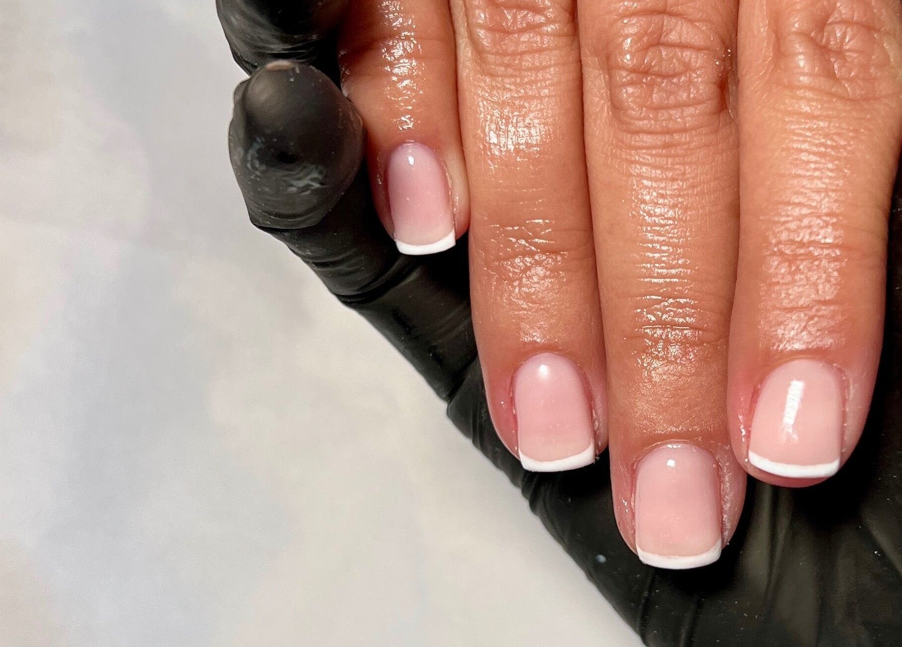 French manicure at DEFINED by Isobel Ruby in Lancaster, England, GB, showcasing detailed nail art.