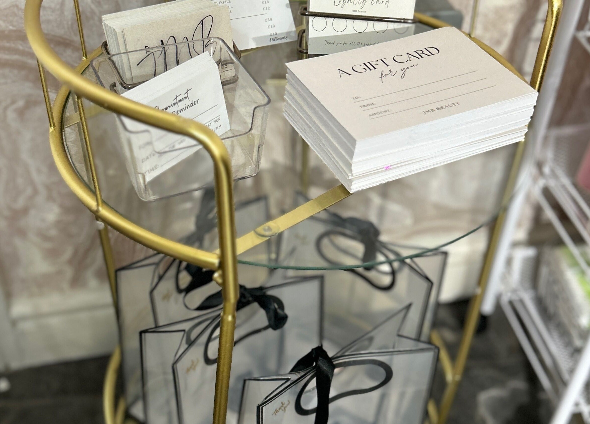 Elegant gift cards and bags at JMBeauty, Brayton, England, GB enhancing gift-giving experience.