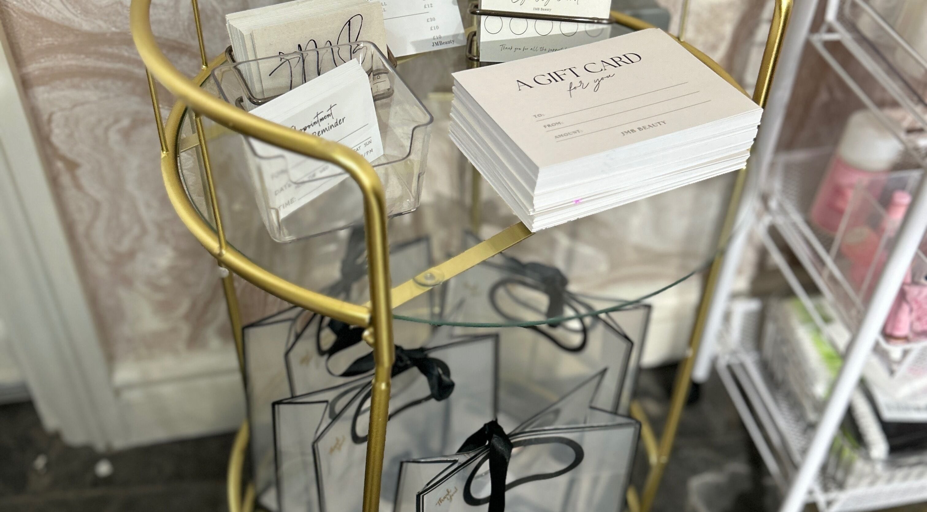 Elegant gift cards and bags at JMBeauty, Brayton, England, GB enhancing gift-giving experience.