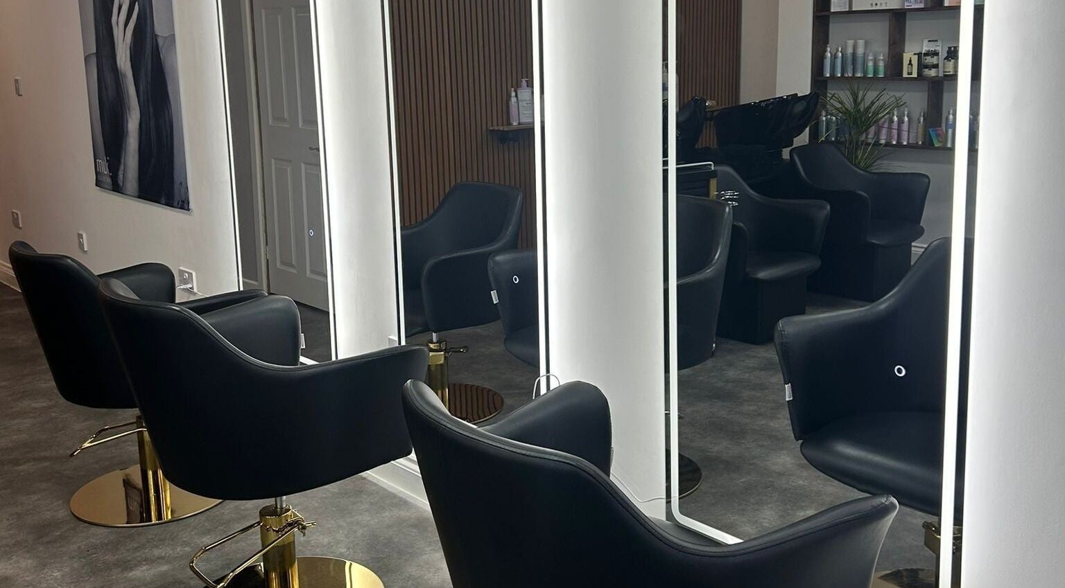 Elegant salon chairs at L.E.V Hair & Beauty, Leicester, England, GB, showcasing modern design and style.