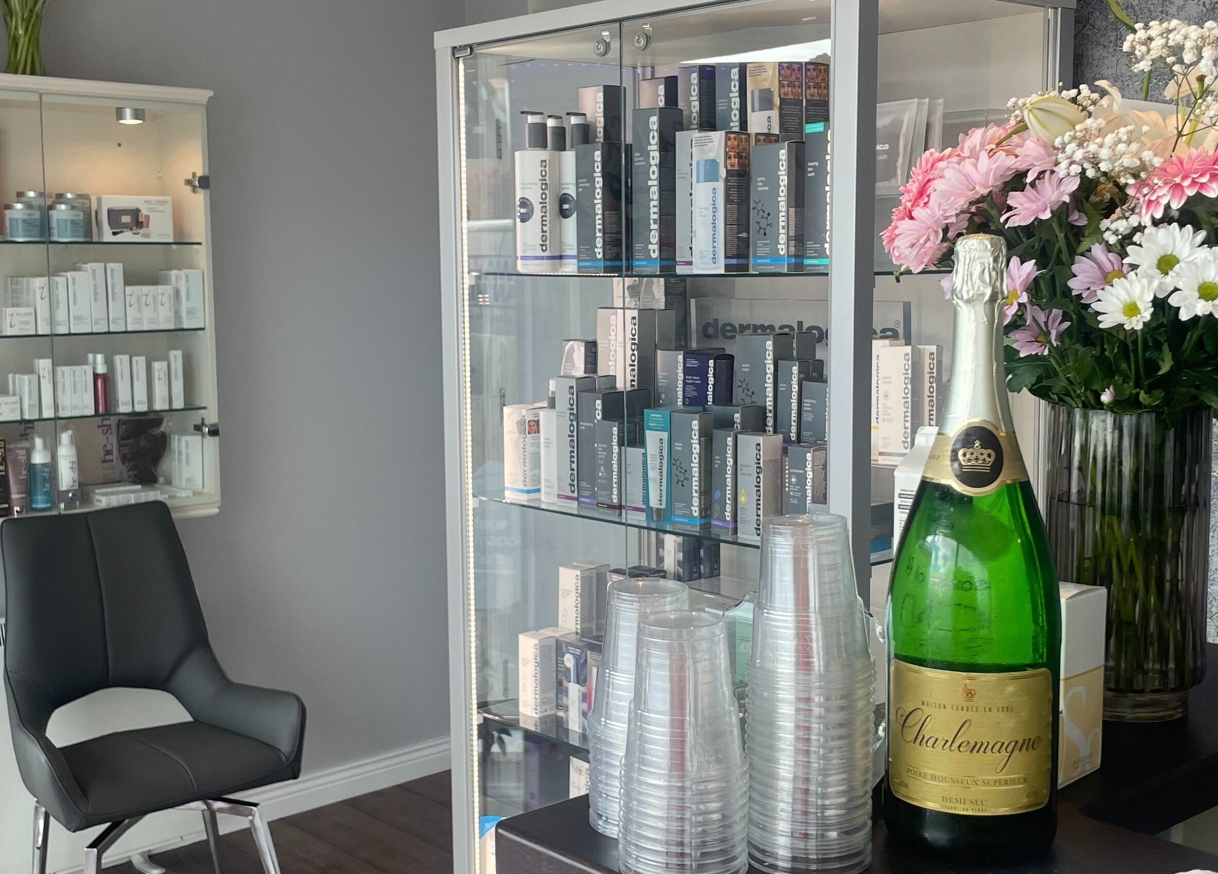 Product display at Visions Beauty Clinic, Galway, County Galway, IE with flowers and champagne.