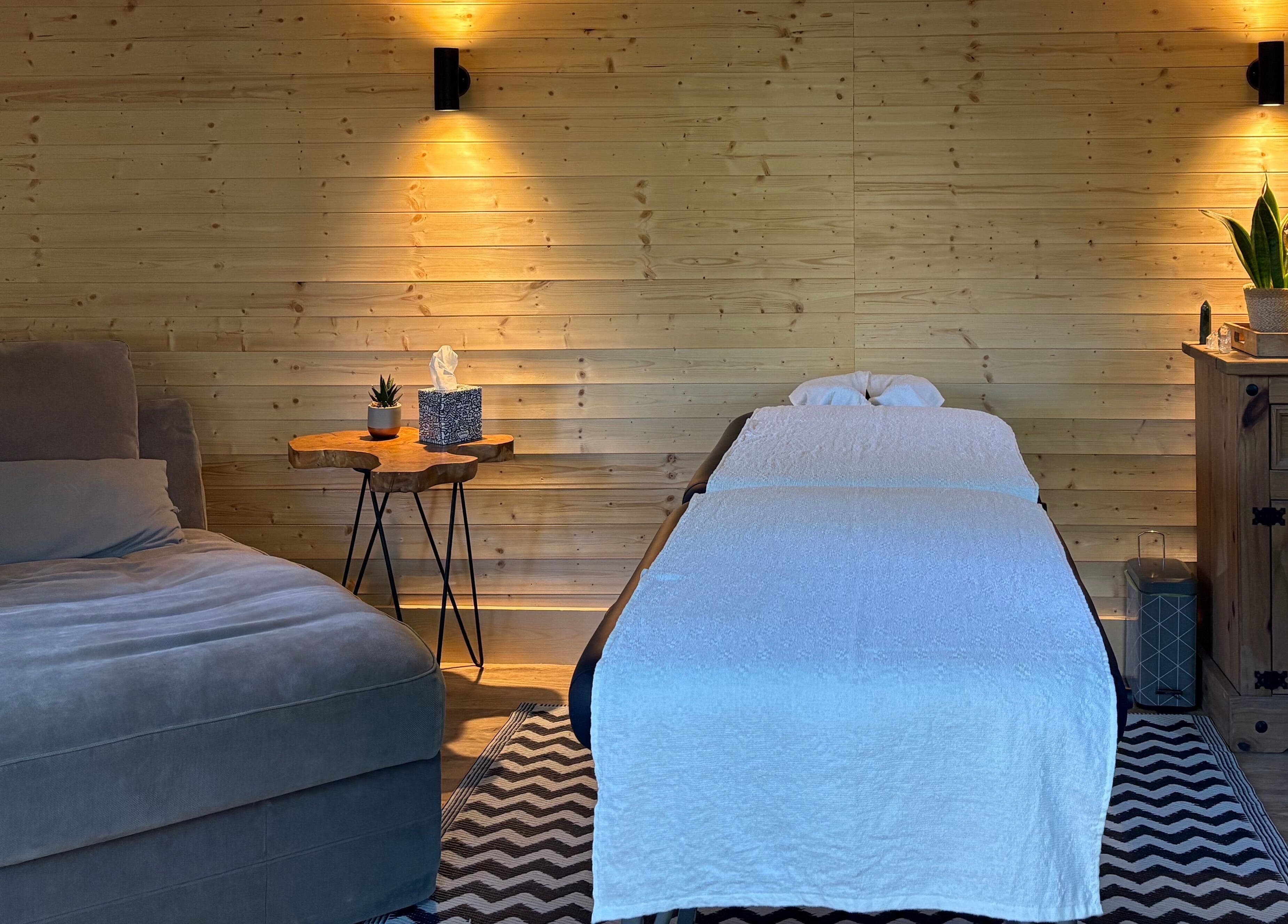 Tranquil therapy room at Frequency Health, Saint Leonard’s on Sea, England, GB with cozy lighting and decor.