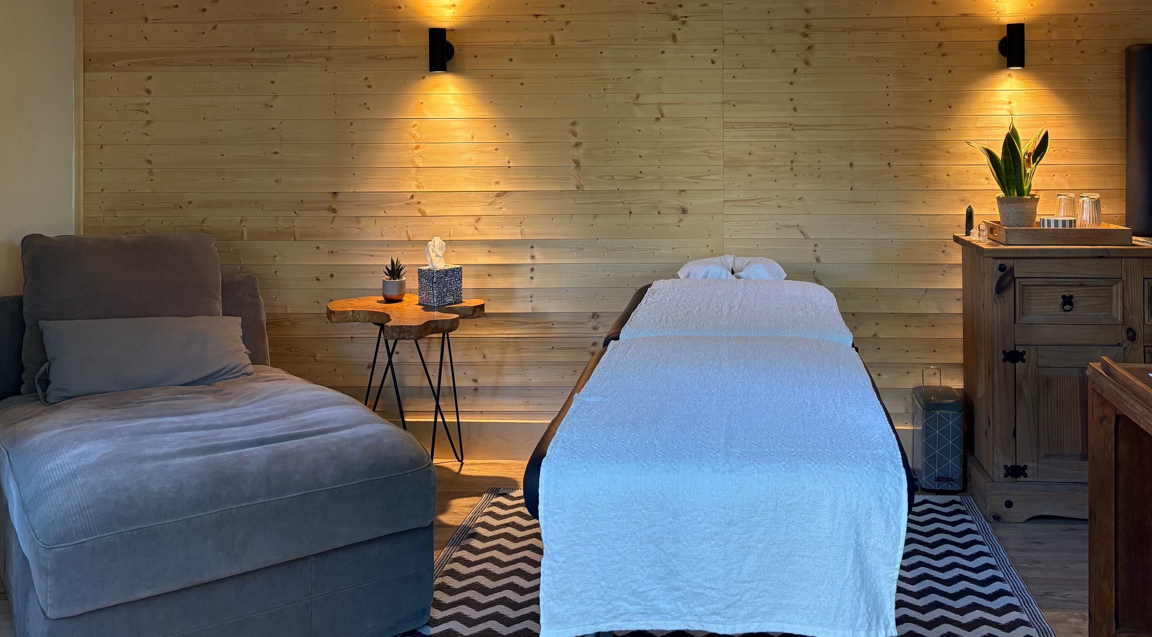 Tranquil therapy room at Frequency Health, Saint Leonard’s on Sea, England, GB with cozy lighting and decor.