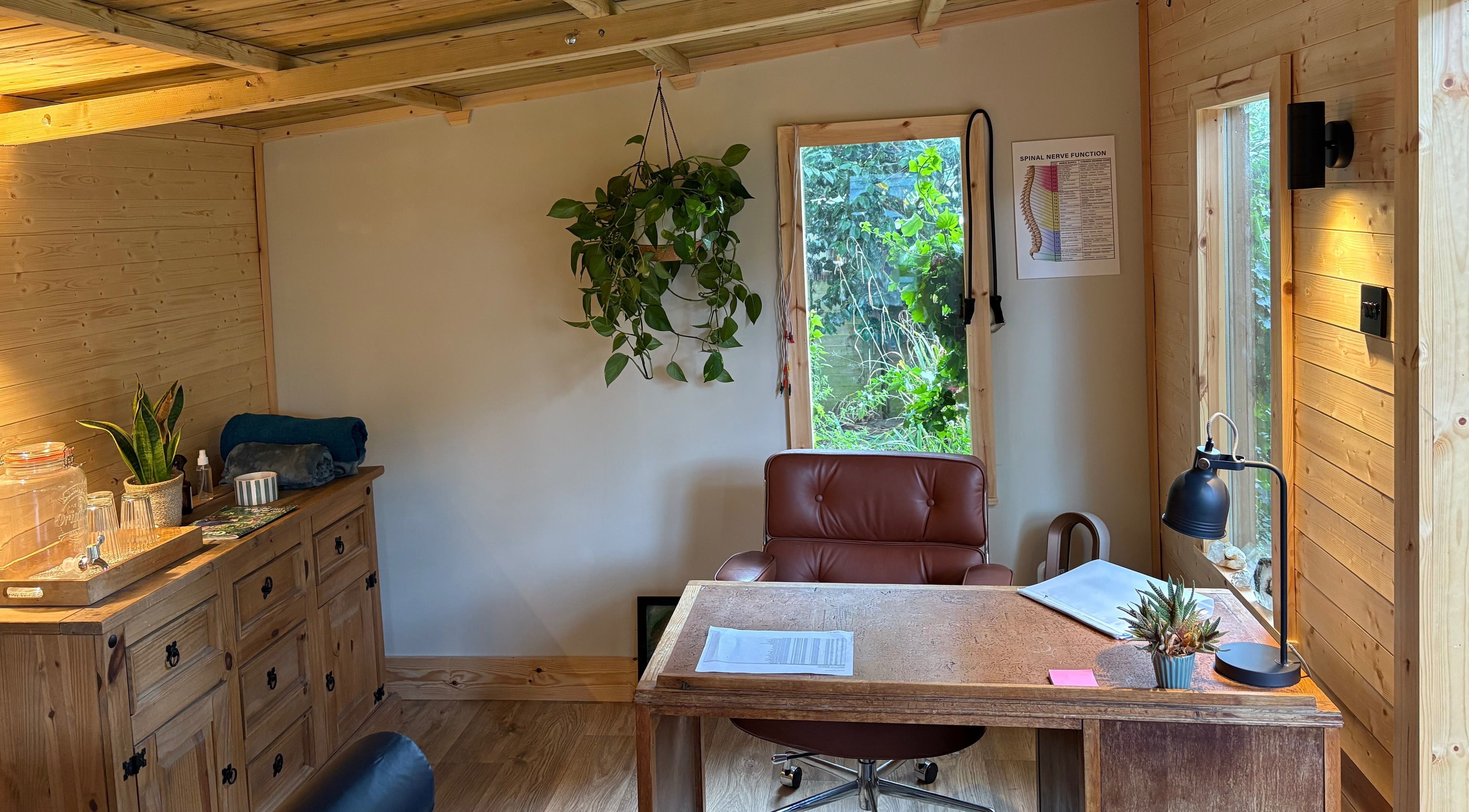 Inviting office space at Frequency Health, Saint Leonard’s on Sea, England, GB, with natural wood decor and greenery.