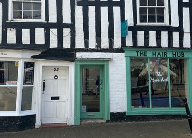 Hair By Ellie Marie at The Hair Hub, Droitwich Spa, England; inviting salon entrance with rustic charm.