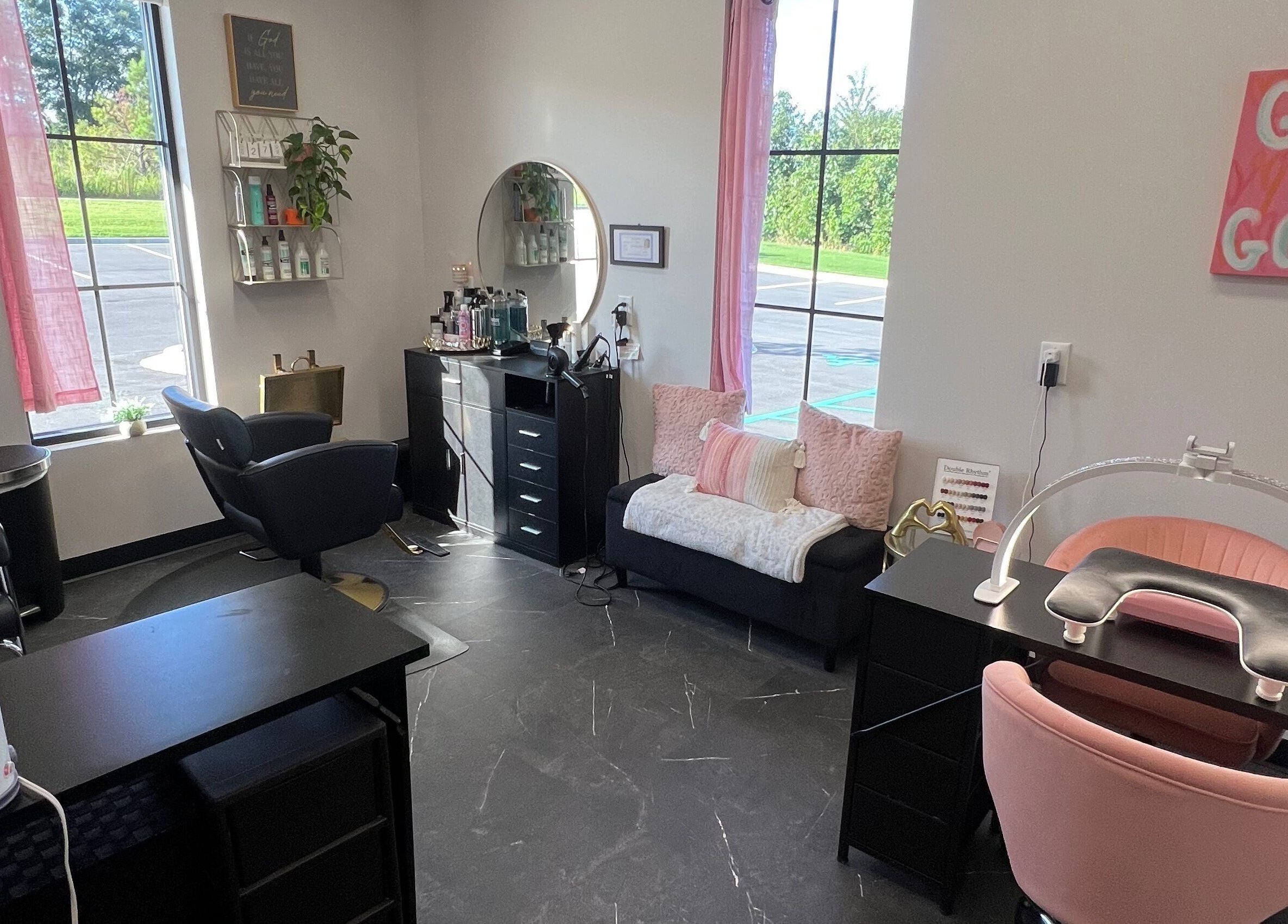 Cozy interior of Beauty By Corbyn in Boiling Springs, South Carolina, US with modern salon chairs.