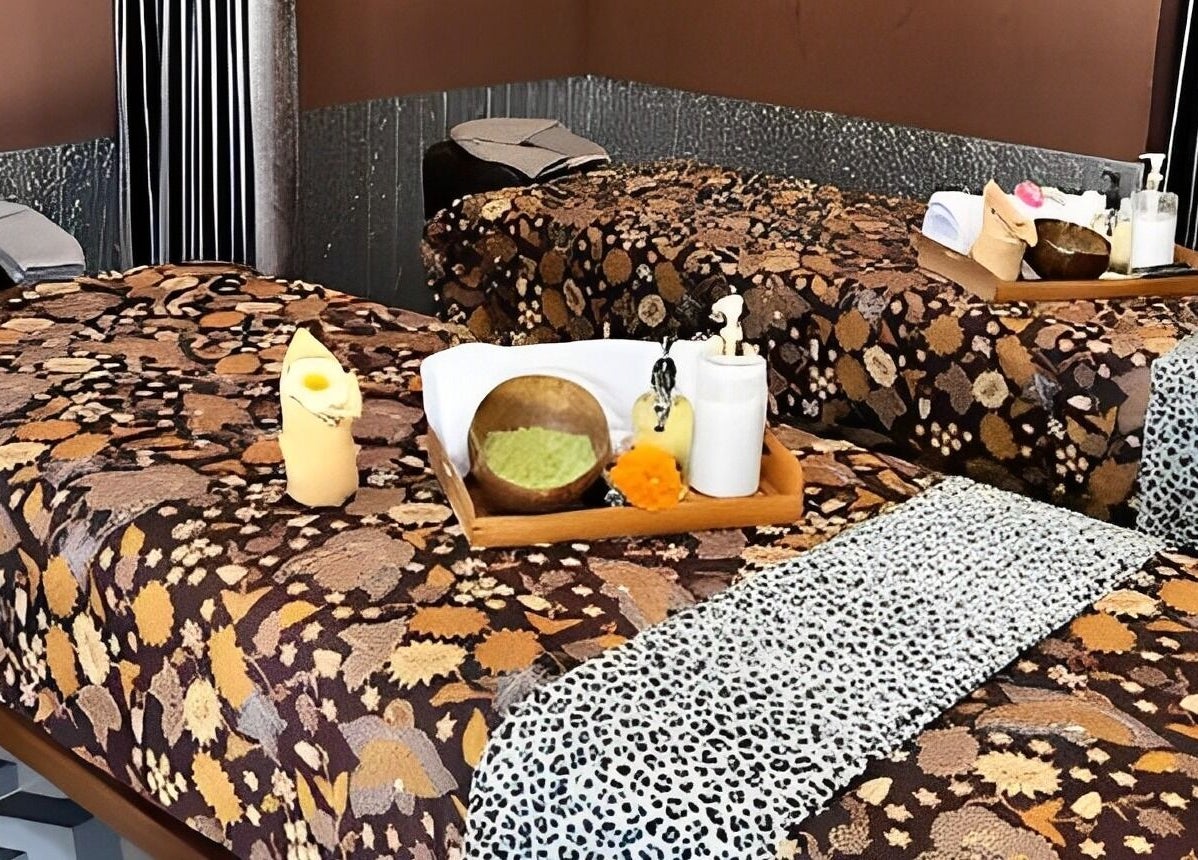 Massage room at Chandra In Spa Massage And Reflexology, Bali, Bali, ID with cozy beds and tranquil decor.