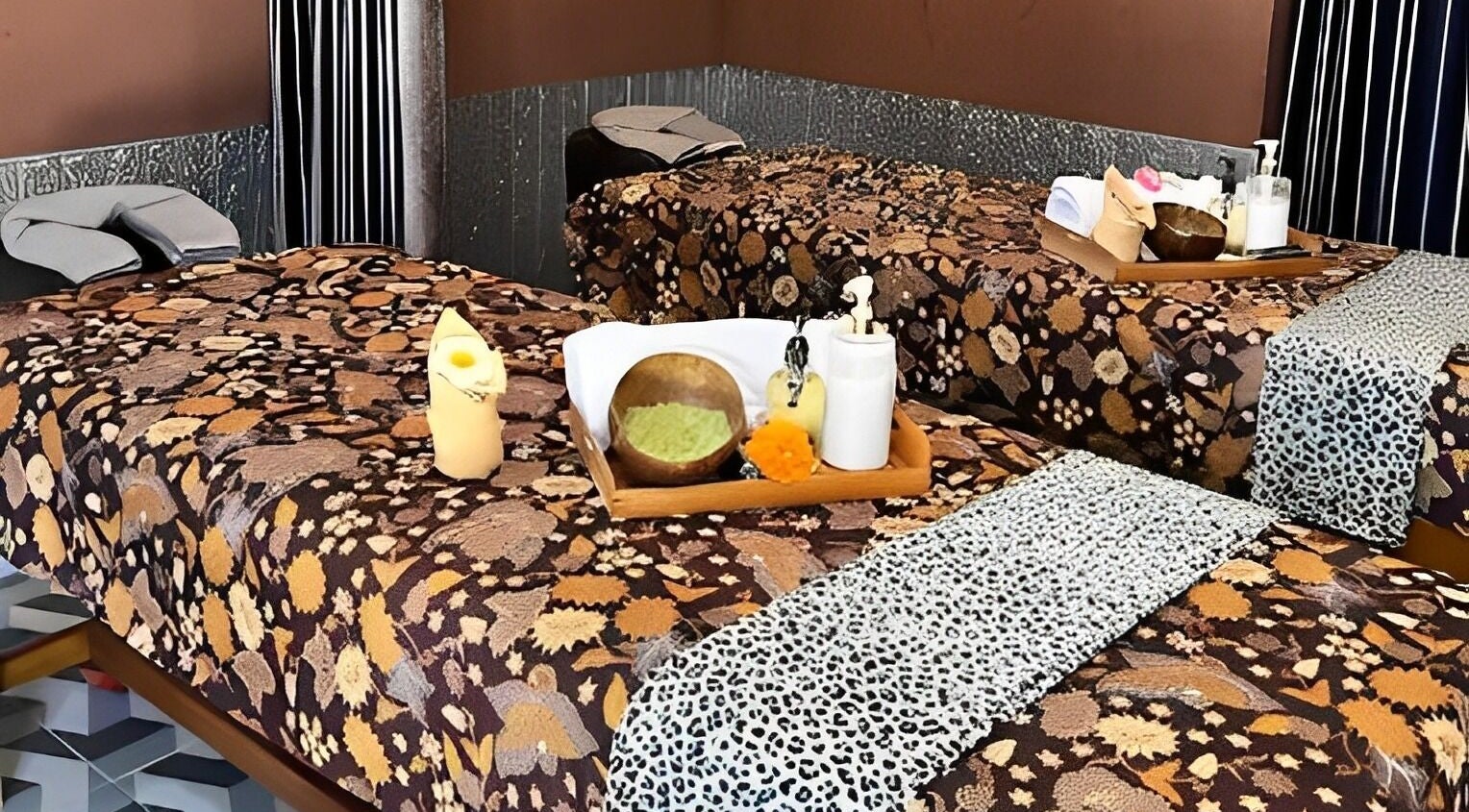 Massage room at Chandra In Spa Massage And Reflexology, Bali, Bali, ID with cozy beds and tranquil decor.