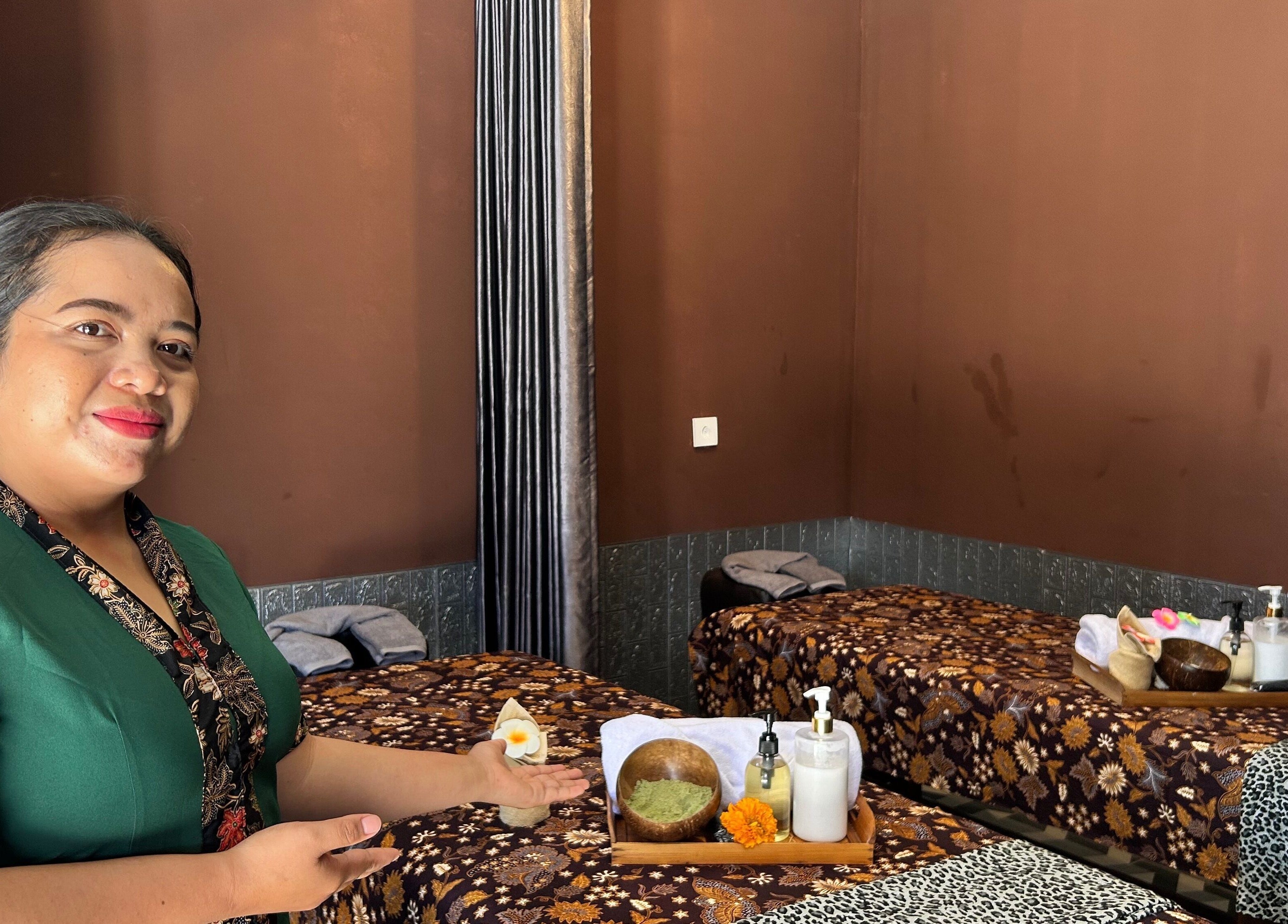 Staff at Chandra In Spa Massage And Reflexology in Bali, Bali, ID, welcomes guests with a serene massage setup.