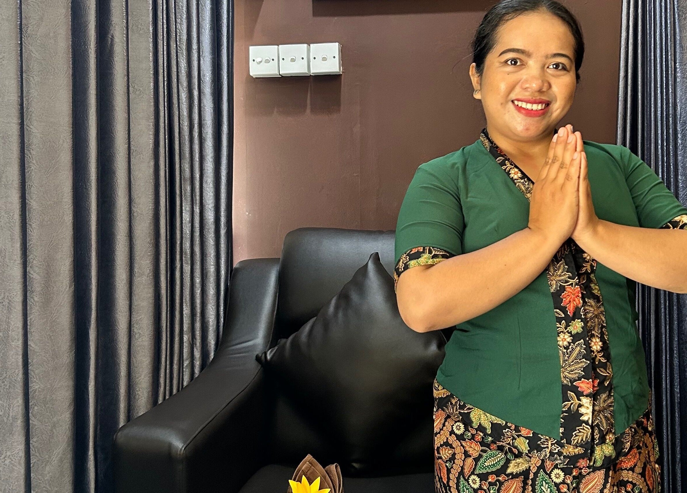 Friendly staff greeting at Chandra In Spa Massage And Reflexology, Bali, Bali, ID, showcasing traditional decor.