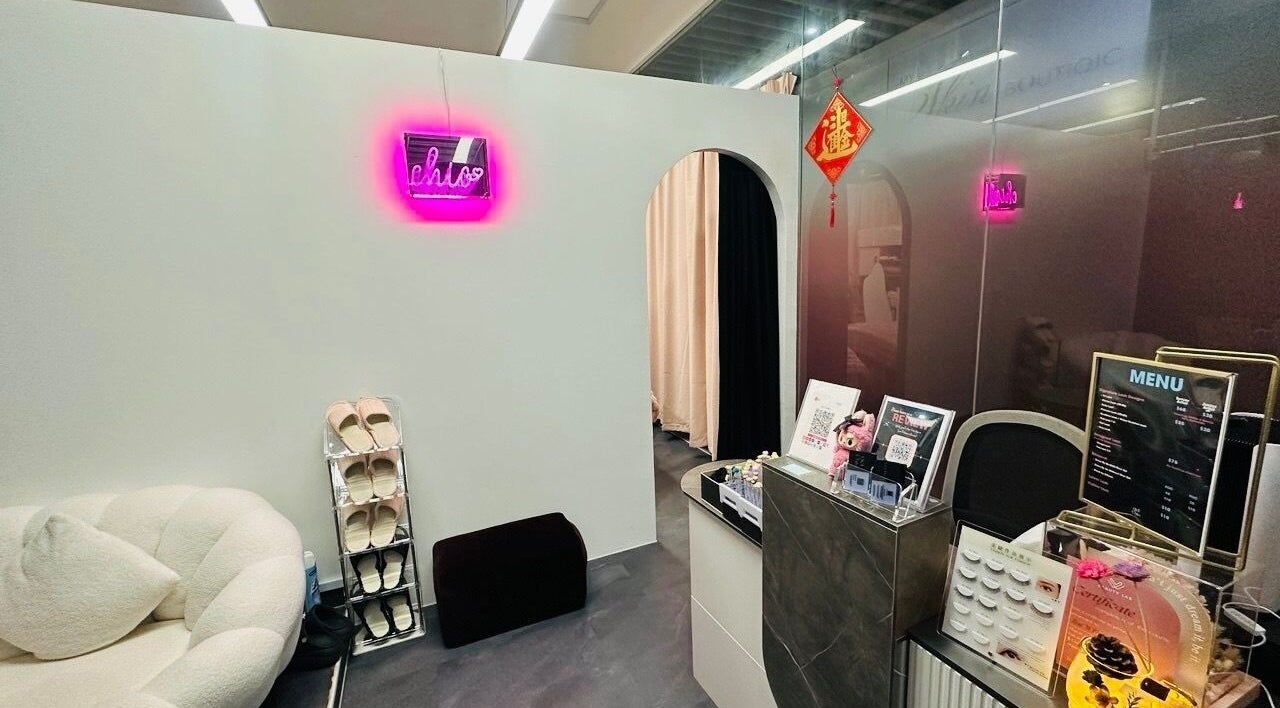 Inviting entrance at Get Chio, Singapore, Singapore, SG with cozy decor and vibrant signage.