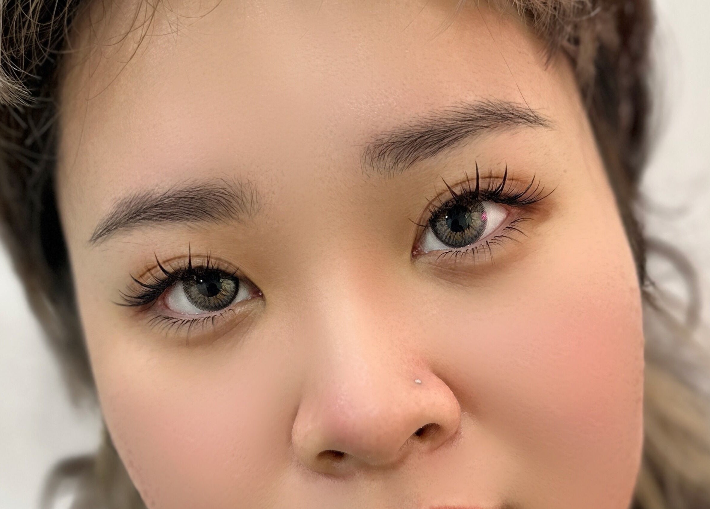 Close-up of expertly applied eyelash extensions at Get Chio, Singapore, Singapore, SG.