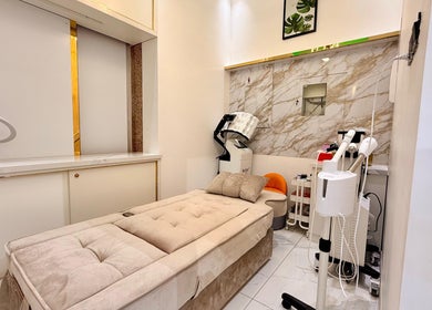 Luxurious treatment room at Artika Beauty Lounge, Dubai, Dubai, AE, featuring elegant decor and modern equipment.