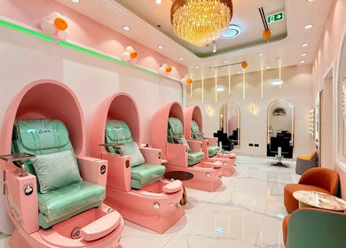 Luxurious pedicure chairs at Artika Beauty Lounge, Dubai, Dubai, AE with stylish decor and ambient lighting.