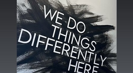 Inspirational wall art at Luxe Hair Studio, Edinburgh, Scotland, GB, showcasing unique style.