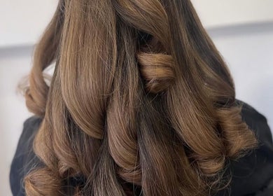 Beautifully styled brown curls at Luxe Hair Studio in Edinburgh, Scotland, GB.