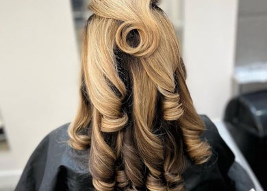 Sophisticated curled hairstyle at Luxe Hair Studio, Edinburgh, Scotland, GB.