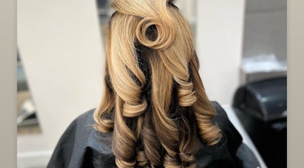 Sophisticated curled hairstyle at Luxe Hair Studio, Edinburgh, Scotland, GB.